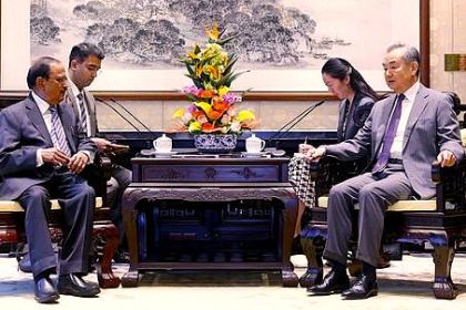 WANG-YI-WITH-DOVAL.jpg